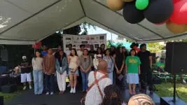 Teens receiving scholarships at My Tribe Rise Juneteenth event