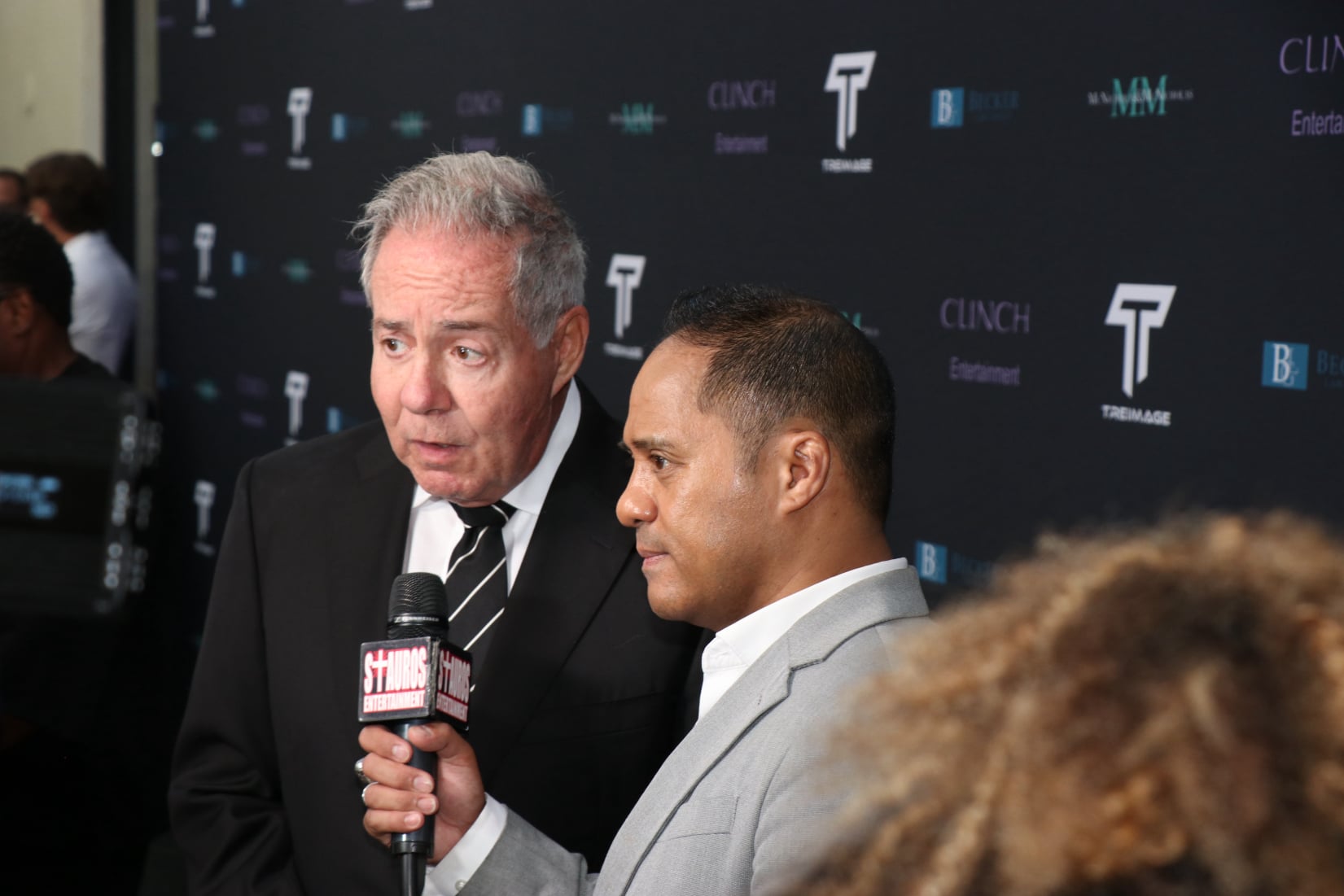 Todd Becker doing interview at Pre-Espy event that his firm sponsored