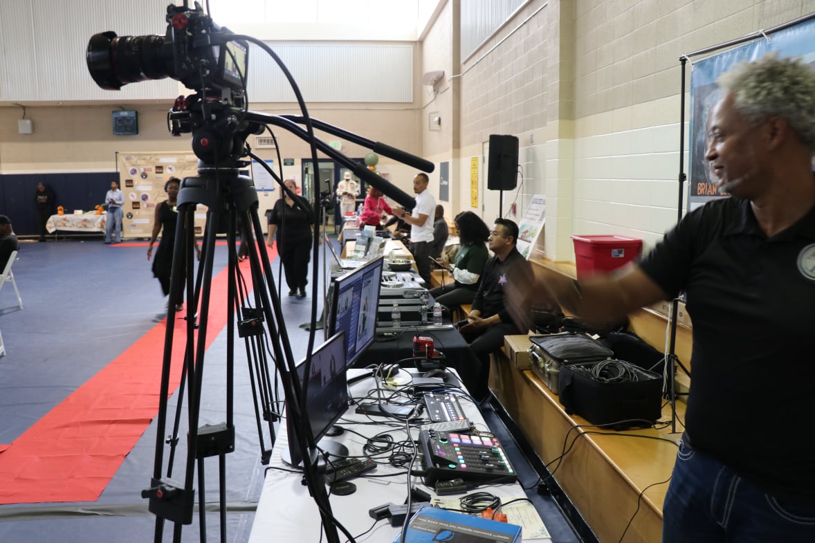 Brian manning the camera during the Day of Thanks Luncheon