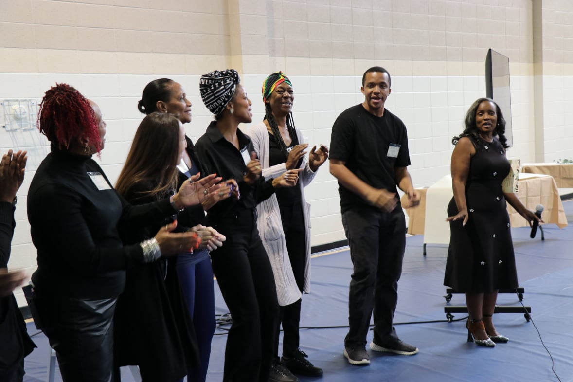 Giving volunteers their flowers at the Day of Thanks Luncheon